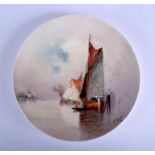 Minton wall plate painted by J. E. Dean with a Dutch Canal Scene signed and dated J E Dean 1926 wit