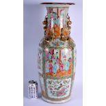 A LARGE 19TH CENTURY CHINESE CANTON FAMILLE ROSE PORCELAIN VASE Qing, painted with figures and chil