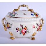 Derby tureen and cover on four feet with lion head masks painted with flowers, red mark. 17cm wide