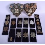 A PAIR OF MILITARY BORDER REGIMENT SWEETHEART CUSHIONS together with assorted badges. (qty)