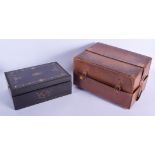 A 19TH CENTURY LEATHER CASED CARVED WOOD SEWING BOX with fitted interior, inlaid with brass and mot