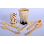 A 19TH CENTURY INDIAN CARVED IVORY OPENWORK BEAKER together with a horn cup etc. (7)