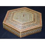 A Persian hexagonal shaped decorated box 26 x 5cm
