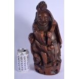 A 19TH CENTURY CHINESE CARVED BAMBOO FIGURE OF A BUDDHA Qing, modelled holding a gourd. 36 cm x 16