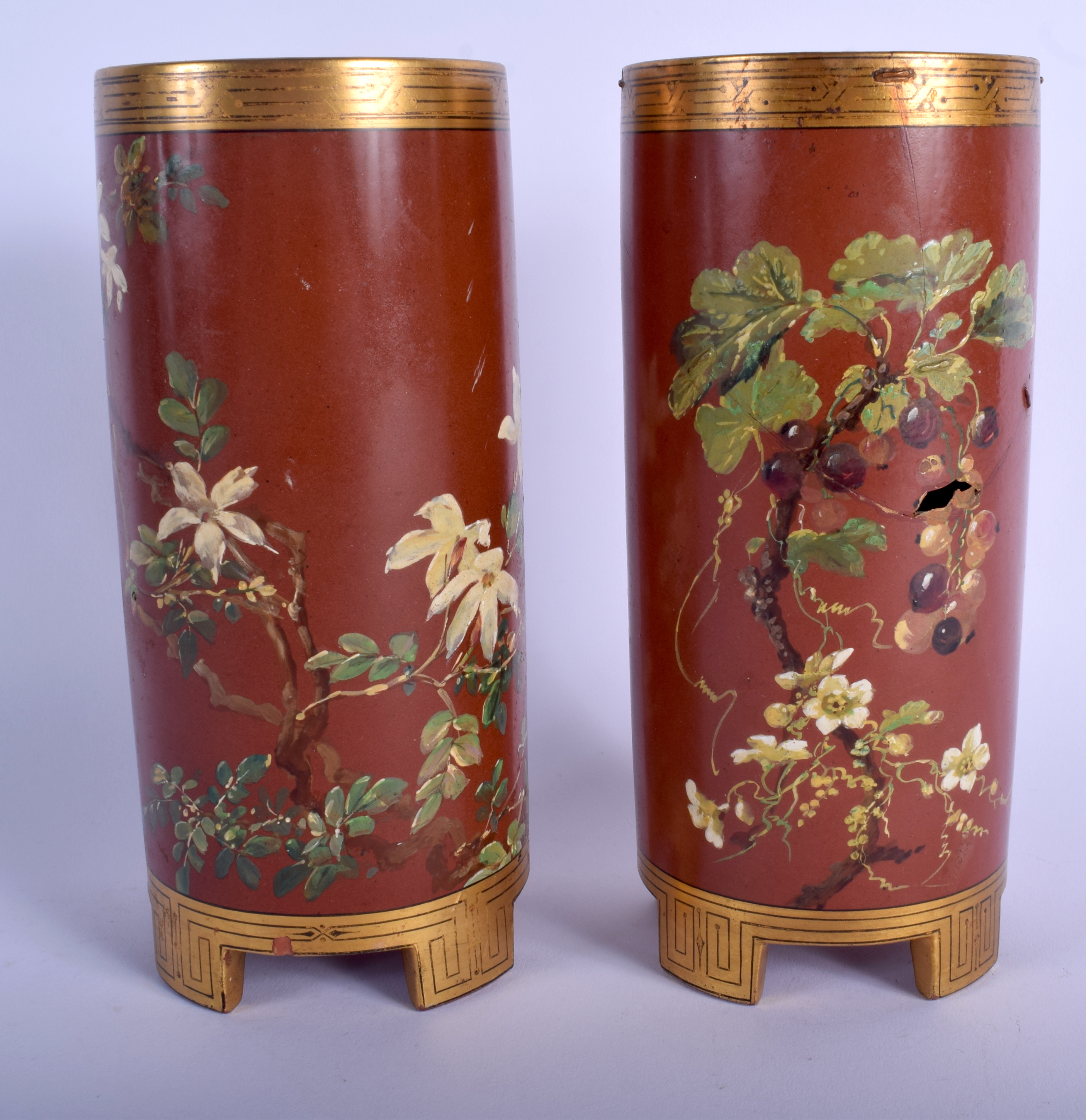 A RARE PAIR OF MINTON ARTS AND CRAFTS POTTERY VASES enamelled with fruiting vines. 20 cm high.