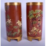 A RARE PAIR OF MINTON ARTS AND CRAFTS POTTERY VASES enamelled with fruiting vines. 20 cm high.