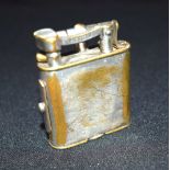 A vintage Dunhill lighter with side lock