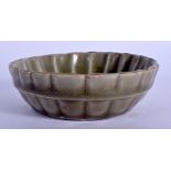 AN EARLY CHINESE YUAN/MING DYNASTY CELADON BRUSH WASHER of fluted form. 10 cm diameter.