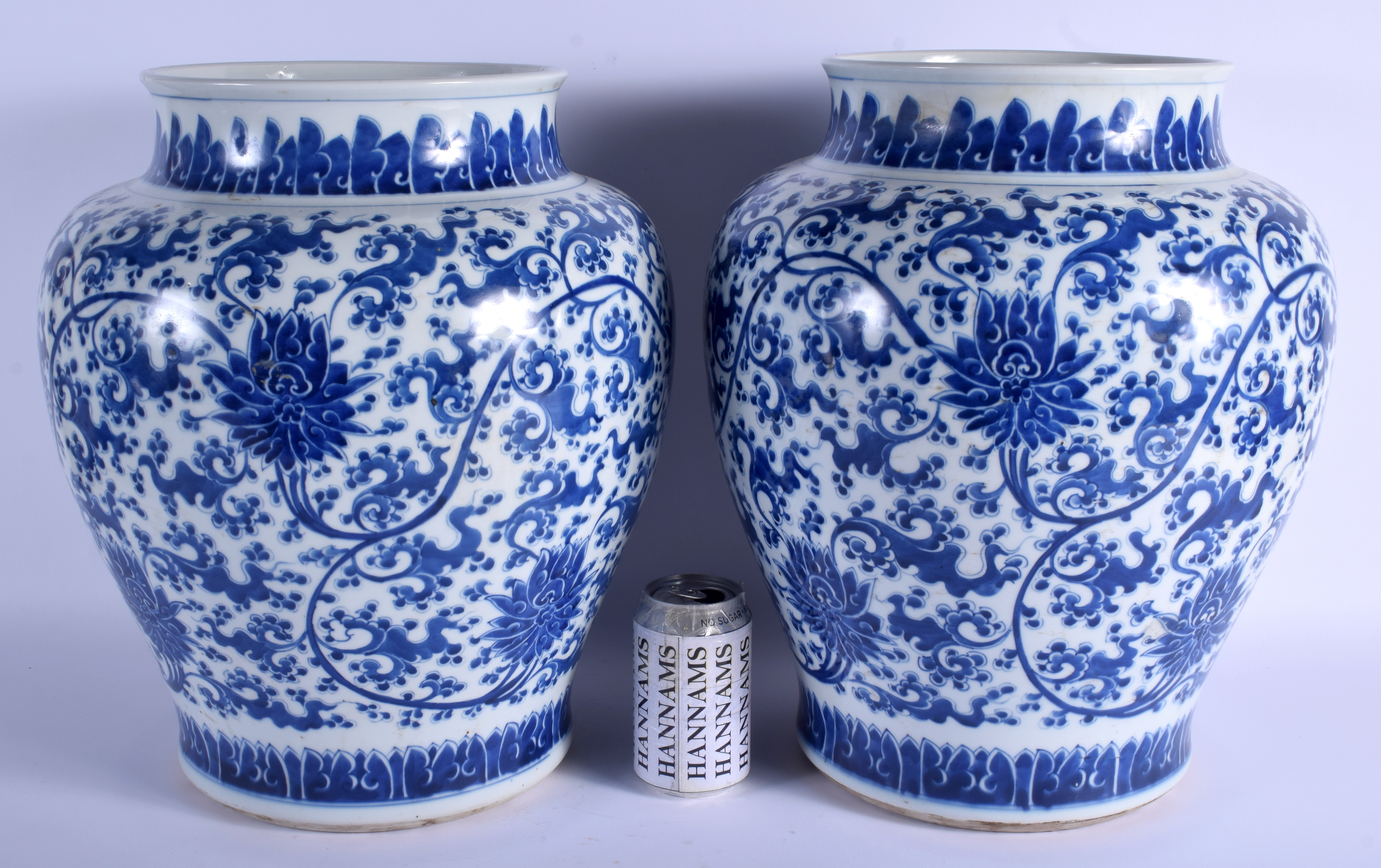 A LARGE PAIR OF CHINESE BLUE AND WHITE PORCELAIN BALUSTER VASES probably Mid Qing Dynasty, painted