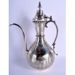 A GOOD LARGE MIDDLE EASTERN TURKISH SILVER EWER decorated with motifs, tughra mark. 1135 grams. 34