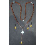 Bead necklace with a Turquoise stone. 184cm