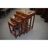A NEST OF FOUR EARLY 20TH CENTURY CHINESE IVORY INLAID TABLES Late Qing. Largest 68 cm x 52 cm. (4)
