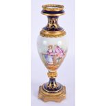 A 19TH CENTURY FRENCH SEVRES PORCELAIN VASE painted with lovers. 26 cm high.