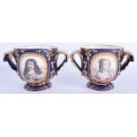 A PAIR OF 19TH CENTURY FRENCH SEVRES TWIN HANDLED PORCELAIN CACHE POTS painted with armorials and p