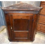 An 18th C Oak hanging Cupboard. 97cm x 79cm