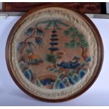 AN ART DECO FRAMED CHINESE EMBROIDERED RUG. 70 cm diameter.