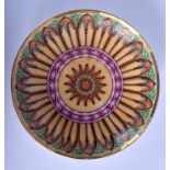 A 19TH CENTURY FRENCH PARIS PORCELAIN SAUCER DISH painted with motifs. 16 cm diameter.