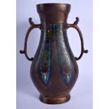 A 19TH CENTURY JAPANESE MEIJI PERIOD TWIN HANDLED BRONZE VASE with champleve enamel decoration. 26