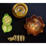 A South African Pottery Zebra, together with a stylish glass vase and two others