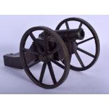 A 19TH CENTURY EUROPEAN BRONZE CANNON modelled upon a wooden plinth. 24 cm x 14 cm.