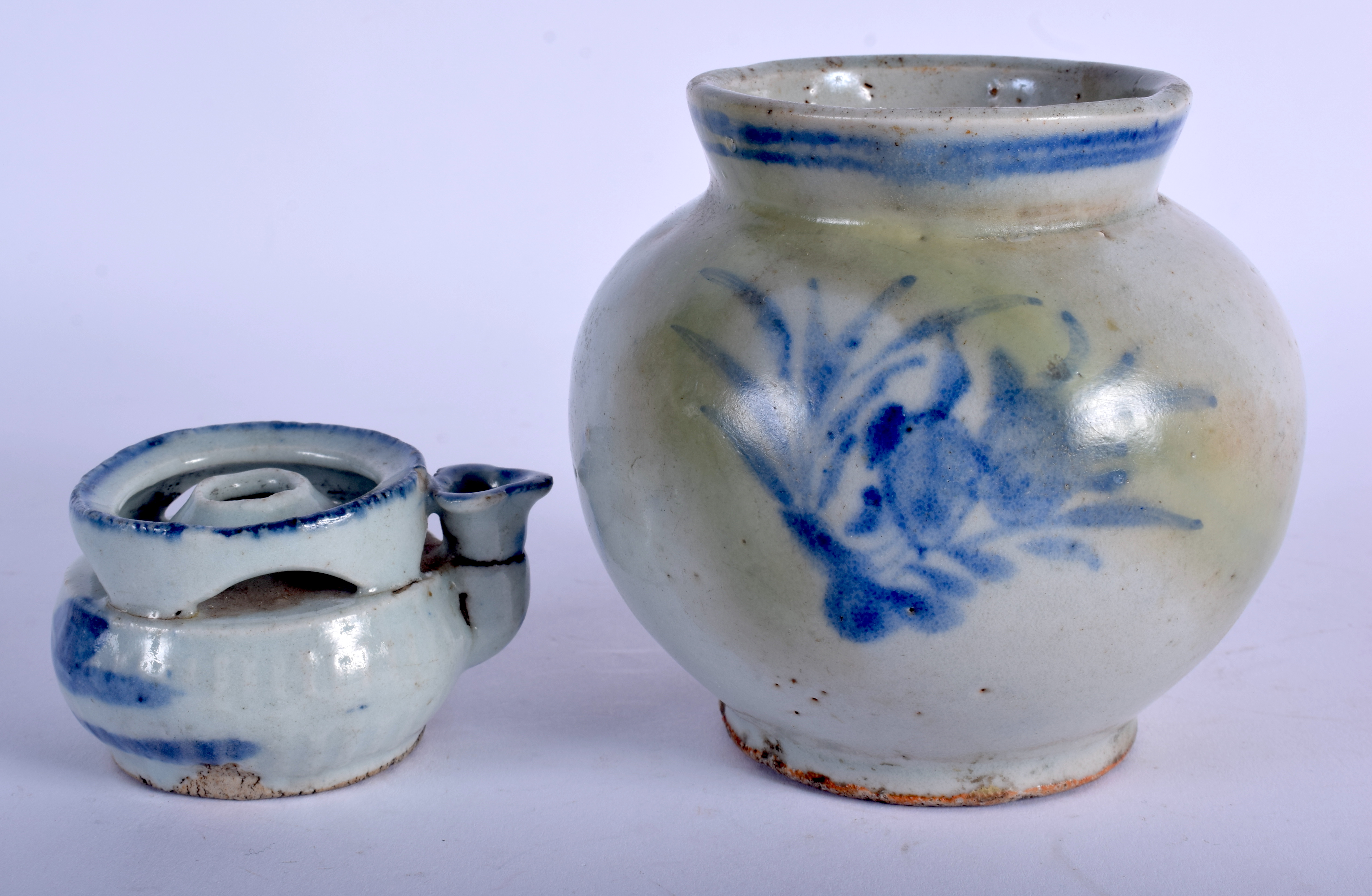 TWO 19TH CENTURY KOREAN BLUE AND WHITE STONEWARE VESSELS. Largest 12 cm x 8 cm. (2)