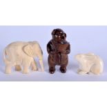 AN EARLY 20TH CENTURY JAPANESE MEIJI PERIOD IVORY RABBIT NETSUKE together with two others. Largest
