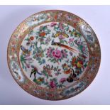 A 19TH CENTURY CHINESE CANTON FAMILLE ROSE PORCELAIN DISH painted with birds and butterflies. 25 cm