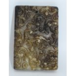 Carved jadeite Tablet decorated with foliage 7 x 4.5cm