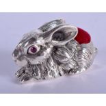 A SILVER HARE PIN CUSHION. 4.5 cm wide.