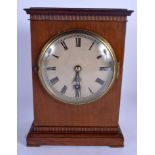 AN EDWARDIAN DENT OF LONDON MANTEL CLOCK with silvered dial and black numerals. 22 cm x 12 cm.