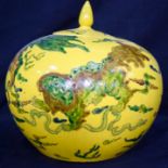 A Chinese lidded yellow ground dragon vase 23cm