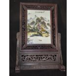A Large framed Chinese Porcelain plaque depicting mountains and rivers