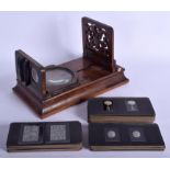 A VICTORIAN STEREOSCOPE PHOTOGRAPHIC VIEWER with unusual slides depicting antique ivory articles. 3