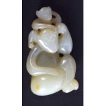 A CHINESE CARVED GREENISH WHITE JADE FIGURE OF MONKEYS 20th Century. 5.5 cm x 3.25 cm.