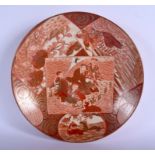 A 19TH CENTURY JAPANESE MEIJI PERIOD KUTANI PORCELAIN CHARGER painted with immortals. 32 cm diamete