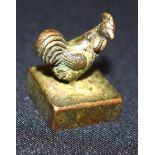 A small Chinese bronze chicken seal 2 x 3cm