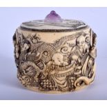 A 19TH CENTURY JAPANESE MEIJI PERIOD CARVED IVORY BOX AND COVER with amethyst finial, decorated wit
