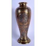 AN ANTIQUE MIDDLE EASTERN SILVER INLAID BRONZE VASE decorated with Kufic script. 27 cm high.