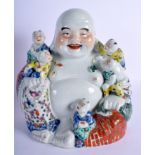 AN EARLY 20TH CENTURY CHINESE FAMILLE ROSE PORCELAIN FIGURE OF A BUDDHA Late Qing/Republic. 28 cm x