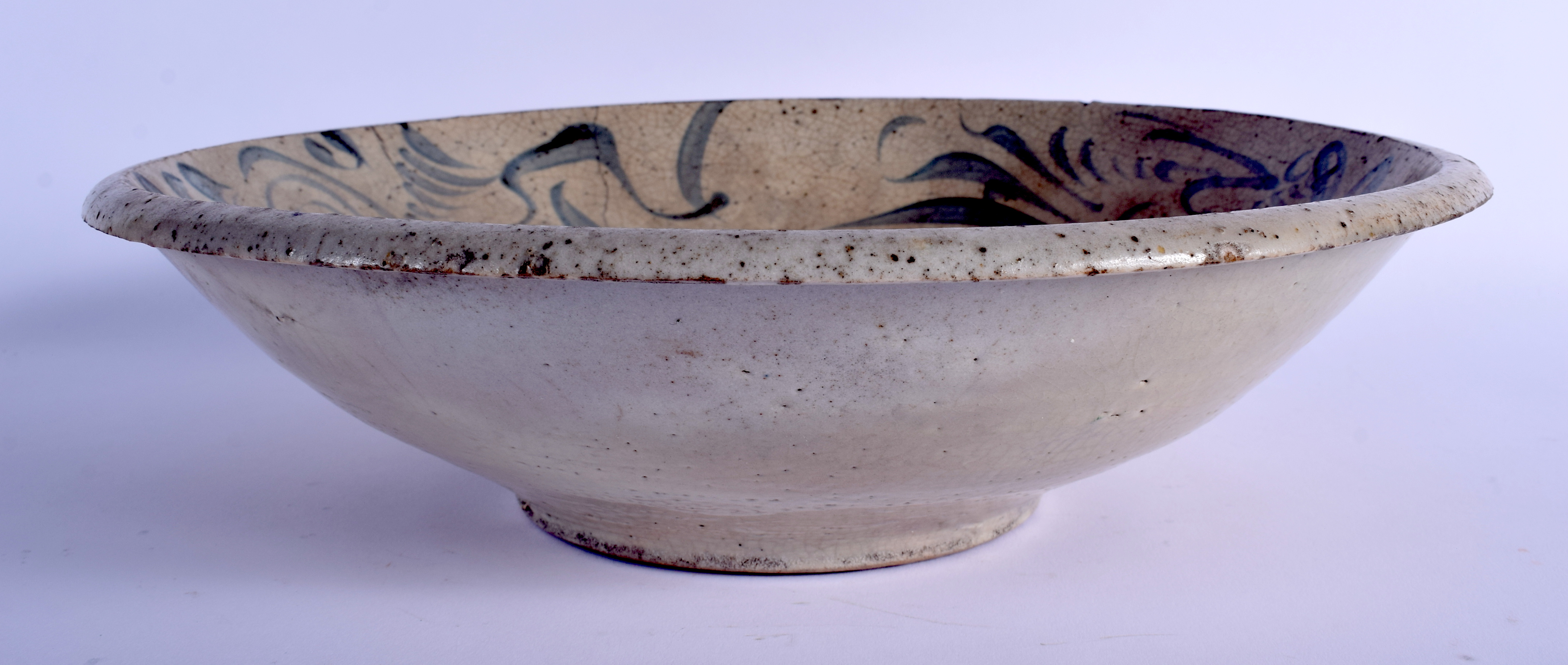 AN 18TH CENTURY CHINESE VIETNAMESE BLUE AND WHITE STONEWARE BOWL painted with swirling motifs. 32 - Image 3 of 4