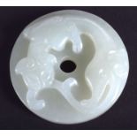 AN EARLY 20TH CENTURY CHINESE CARVED GREEN JADE CHILONG DISC Late Qing/Republic. 4.25 cm diameter.