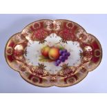 Royal Worcester oval dish painted with fruit under a crimson and gilt border date code 1929. 27.5cm