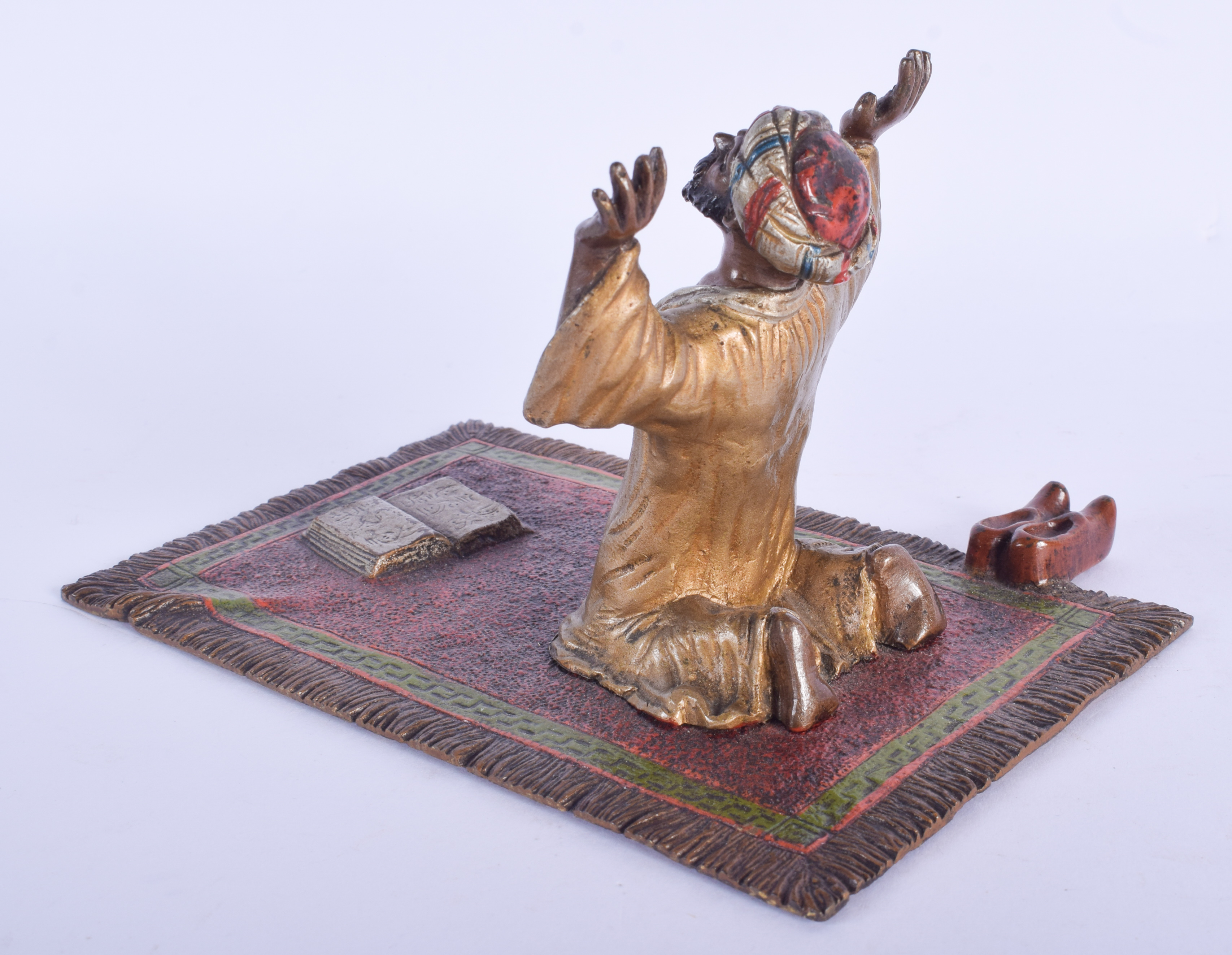 A 19TH CENTURY AUSTRIAN COLD PAINTED BRONZE FIGURE OF AN ARABIC MALE modelled praying upon a rug. 1 - Image 2 of 3