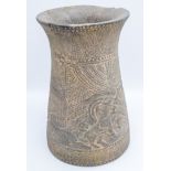 A Middle Eastern Stone Vase carved with animals and trees. 23cm x 15cm