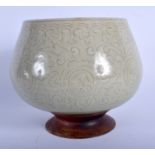 A 19TH CENTURY CHINESE KOREAN CELADON BOWL CENSER decorated with foliage and motifs. 15 cm x 15 cm.