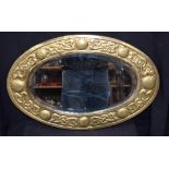 Brass surround bevelled mirror. 60cm x 39cm