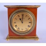 A RARE 1950S JAEGER LE COULTRE AMBER CATALIN BAKELITE CASED DESK CLOCK with bold brass dial. 15 cm