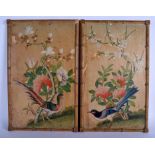 A LARGE PAIR OF 19TH CENTURY INDIAN PAINTED WATERCOLOUR PANELS depicting birds amongst foliage. 51