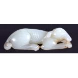 AN EARLY 20TH CENTURY CHINESE CARVED GREENISH WHITE JADE HOUND Late Qing/Republic. 7.25 cm wide.