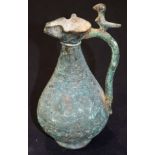 Bronze bird handled Saljuk jug with Inscriptions 18cm